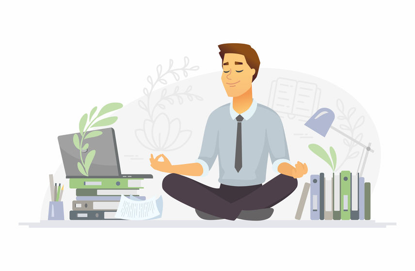 ファイルやパソコンのそばでマインドフルネス瞑想をするビジネスマン